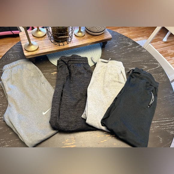 Under Armour Other - 4 pair of boys size Large sweats plus a bonus 5th pair with a small hole.